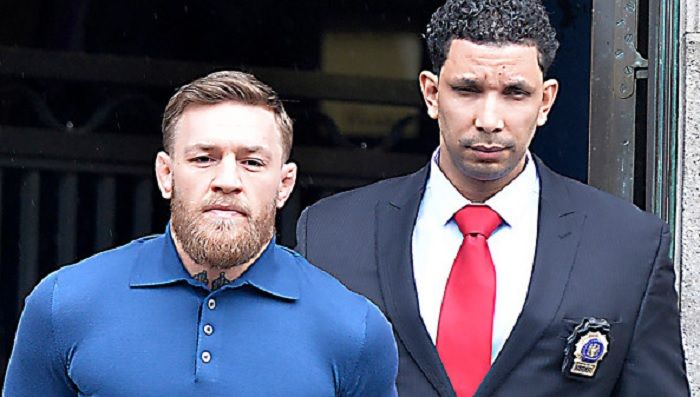 Conor McGregor Exits Police Station In Handcuffs (Video)